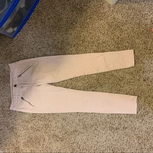 Light pink moto jeans
